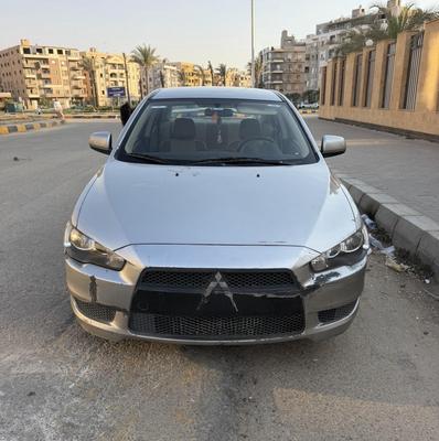ميتسوبيشي لانسر اى اكس شارك 2014