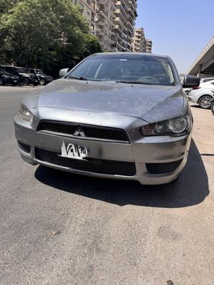 ميتسوبيشي لانسر اى اكس شارك 2014