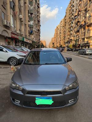 ميتسوبيشي لانسر اى اكس شارك 2015