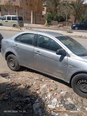 ميتسوبيشي لانسر اى اكس شارك 2014