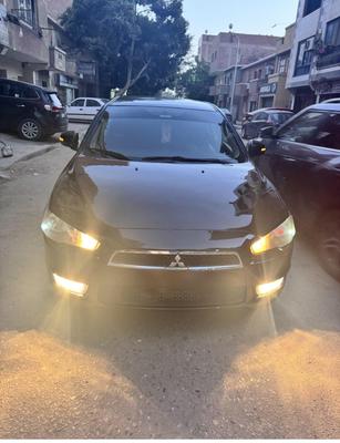 ميتسوبيشي لانسر اى اكس شارك 2015