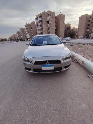 ميتسوبيشي لانسر اى اكس شارك 2014